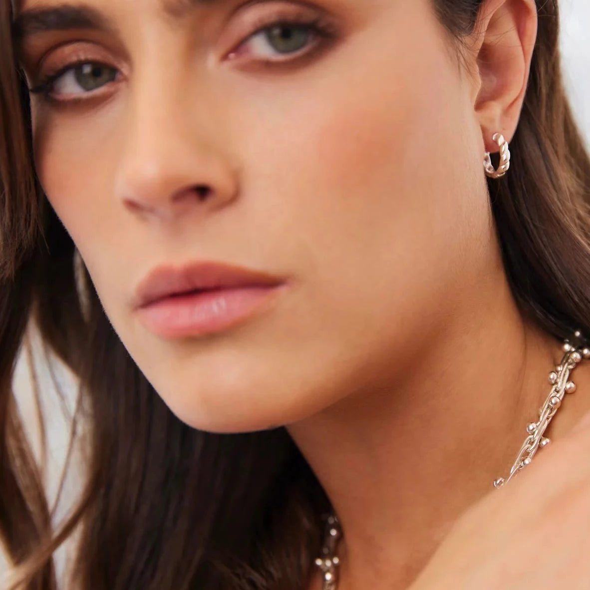 Twist Huggie Earring | Silver