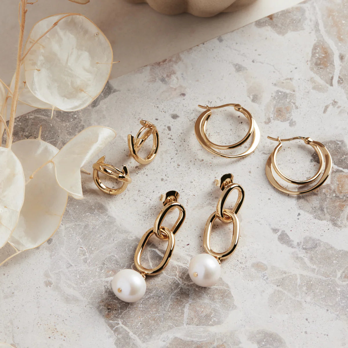 Moonkiss Huggie Earrings | Gold