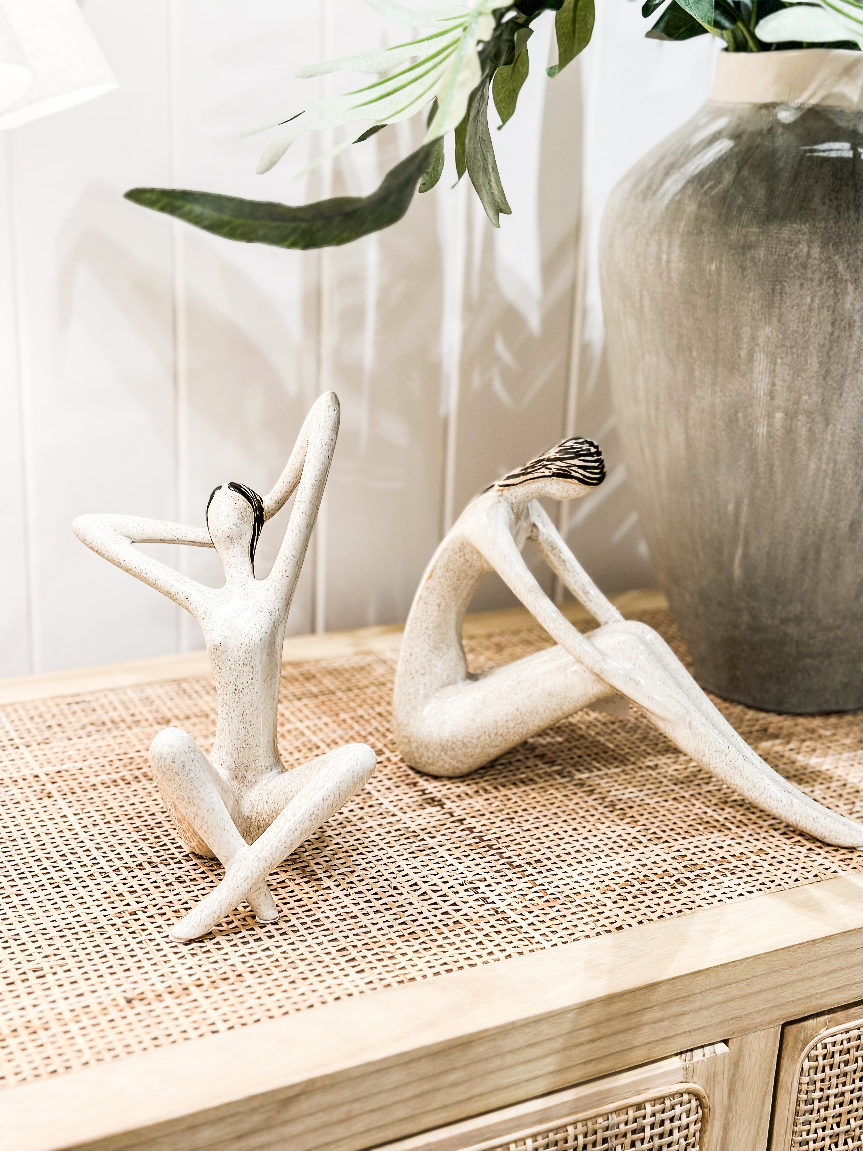 Rice Stone Bone Woman Arms Up